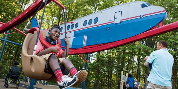 airplane-themed inclusive swing