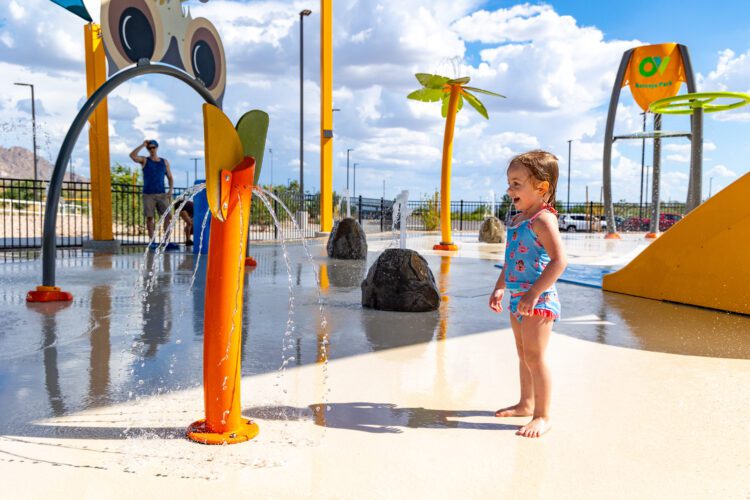 girl playing with water