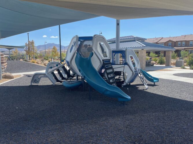 slide coming out of playground equipment