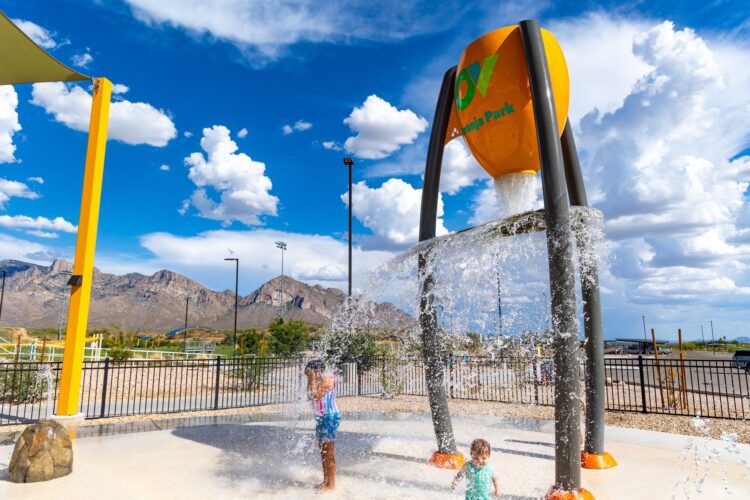 kids getting water dumped on them