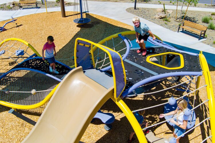 kid standing on top of playground