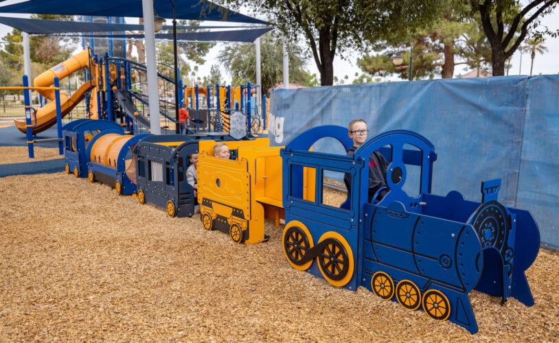 Children playing in a train at the playground
