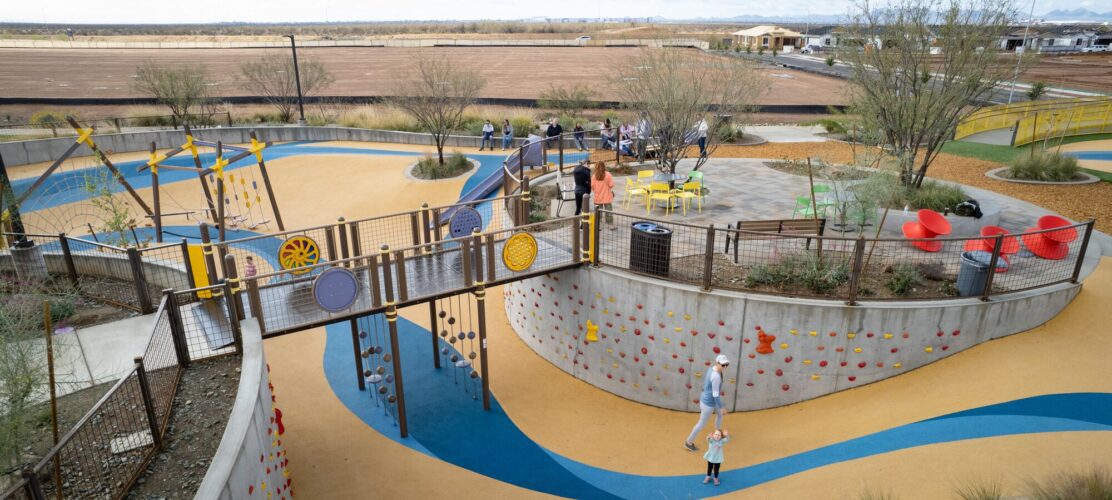 Children playing on commercial playground equipment in Apache Junction, AZ