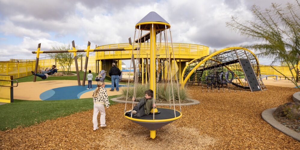 Children play at colorful playground in Apache Junction, AZ