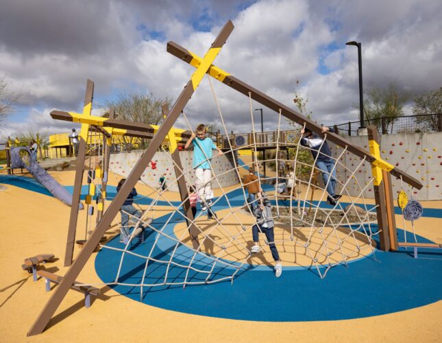 Children play at colorful playground in Apache Junction, AZ