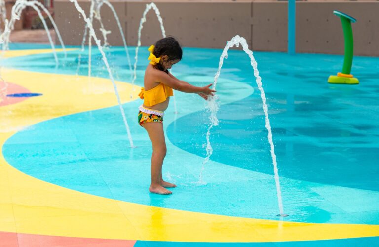 Family-friendly splash pad with kids enjoying water features