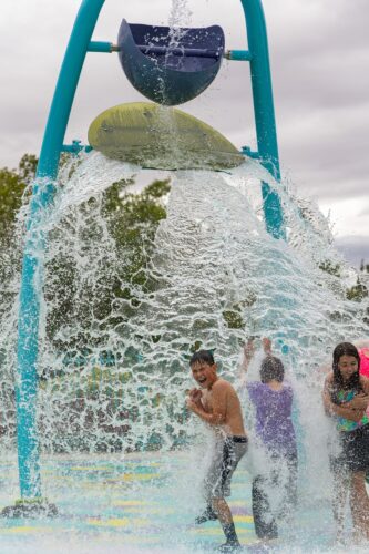 Children play at splash pad, Manzano Mesa Park, Albuquerque, NM