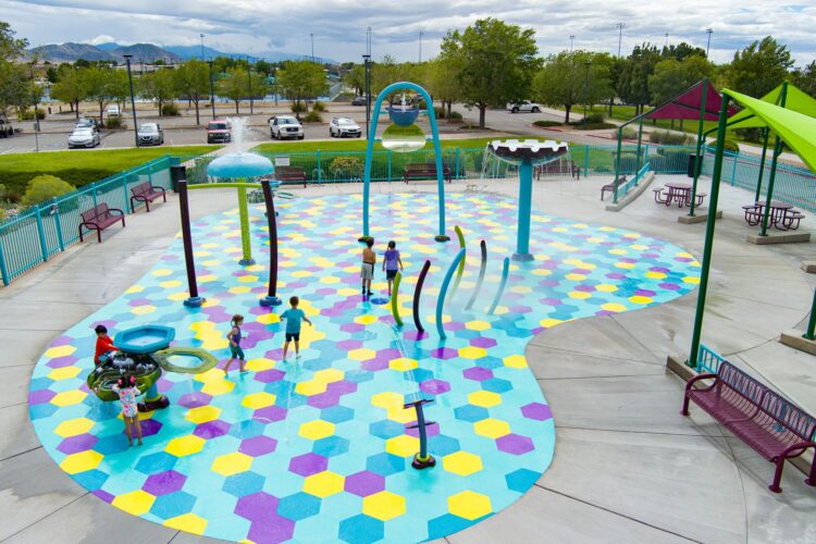 Children play at splash pad, Manzano Mesa Park, Albuquerque, NM