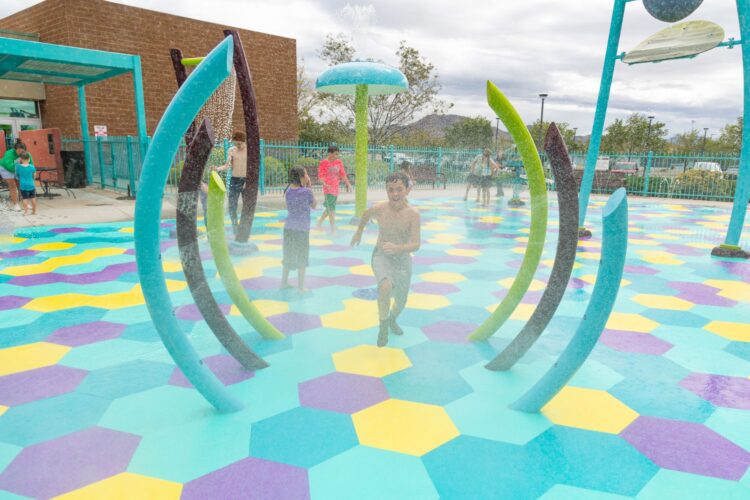 Children play at splash pad, Manzano Mesa Park, Albuquerque, NM