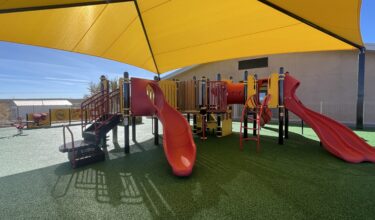 Colorful, inclusive playground at Ojo Encino Day School, Cuba, New Mexico