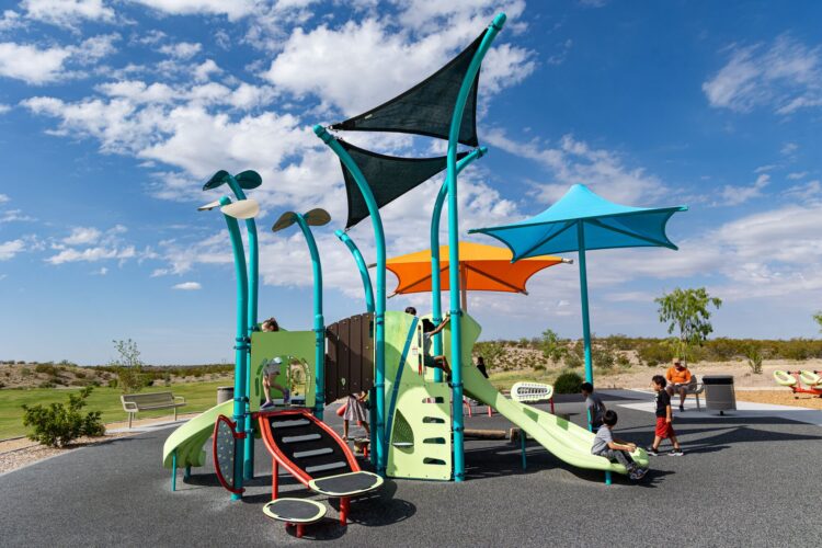 Children play at colorful playground at East Mesa Public Recreation Complex, in Las Cruces, New Mexico