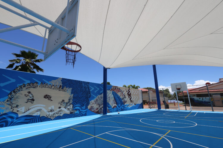 Commercial playground shade structure over sports court at school in Lahaina, Hawaii
