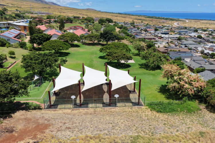 Commercial playground shade structure over sports court at elementary school in Lahaina, Hawaii