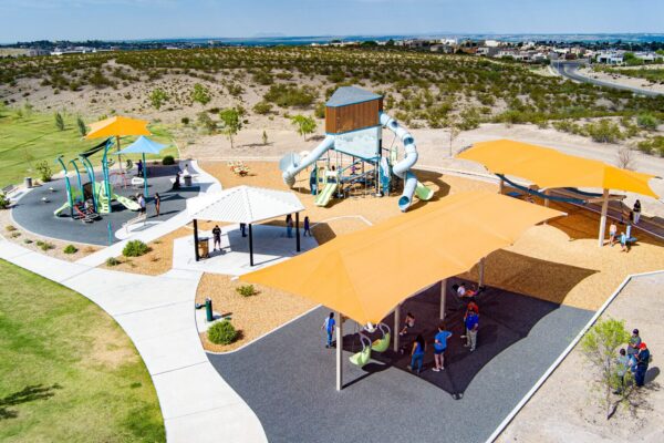 Children play at colorful playground at East Mesa Public Recreation Complex, in Las Cruces, New Mexico